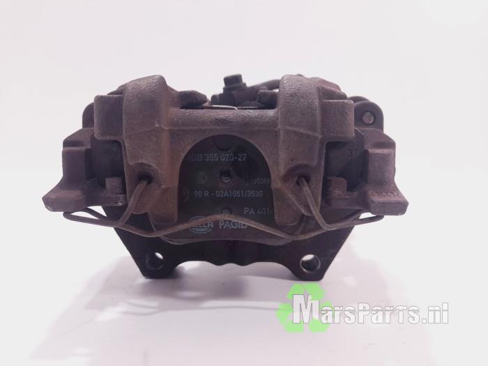 Bakre bromsok, vänster från en Volkswagen Golf VII (AUA) 1.4 TSI 16V 2014