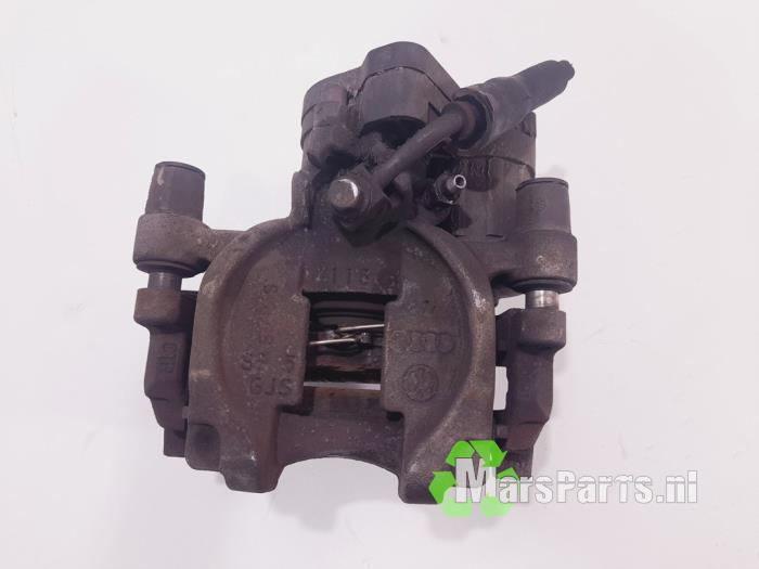 Bakre bromsok, vänster från en Volkswagen Golf VII (AUA) 1.4 TSI 16V 2014