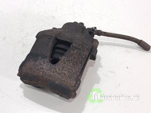 Używane Zacisk hamulcowy lewy przód Volkswagen Polo V (6R) 1.2 TDI 12V BlueMotion Cena € 18,00 Procedura marży oferowane przez Autodemontagebedrijf De Mars