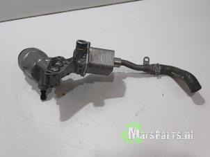 Używane Obudowa filtra oleju Skoda Fabia II Combi 1.2 TDI 12V Greenline Cena € 80,00 Procedura marży oferowane przez Autodemontagebedrijf De Mars