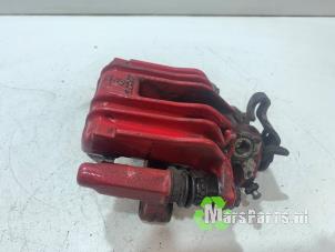 Używane Zacisk hamulcowy prawy tyl Volkswagen Polo V (6R) 1.8 GTI 16V Cena € 30,00 Procedura marży oferowane przez Autodemontagebedrijf De Mars