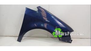 Używane Blotnik prawy przód Volkswagen Touran (1T1/T2) 1.6 FSI 16V Cena € 50,00 Procedura marży oferowane przez Autodemontagebedrijf De Mars