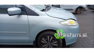 Używane Blotnik prawy przód Mazda 5 (CR19) 1.8i 16V Cena € 35,00 Procedura marży oferowane przez Autodemontagebedrijf De Mars