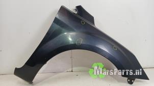 Używane Blotnik prawy przód Ford Focus 2 Wagon 1.8 16V Cena € 50,00 Procedura marży oferowane przez Autodemontagebedrijf De Mars