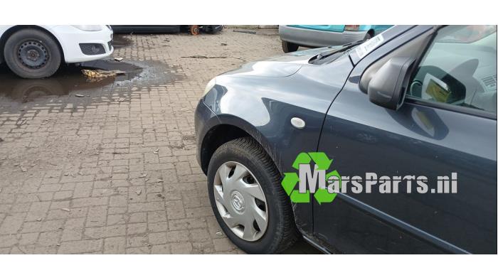 Framskärm, vänster från en Mazda 2 (NB/NC/ND/NE) 1.25 16V 2007
