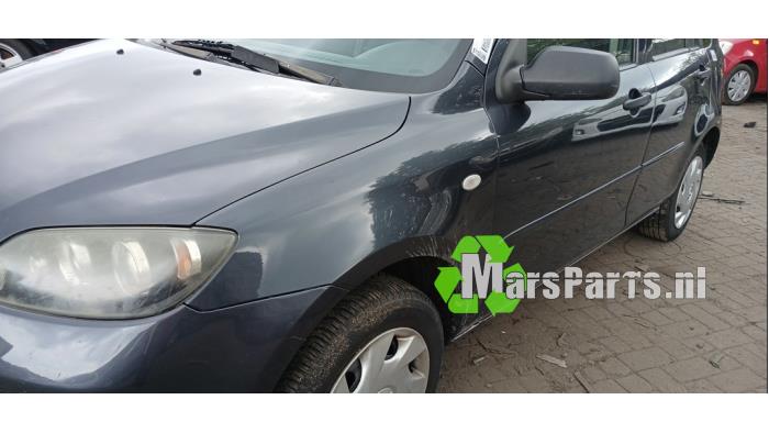 Framskärm, vänster från en Mazda 2 (NB/NC/ND/NE) 1.25 16V 2007