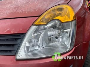 Używane Reflektor lewy Renault Modus/Grand Modus (JP) 1.4 16V Cena € 40,00 Procedura marży oferowane przez Autodemontagebedrijf De Mars