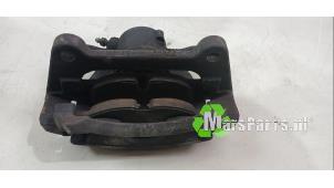 Używane Zacisk hamulcowy lewy przód Volkswagen Caddy Combi IV 1.4 TSI 16V Cena € 50,00 Procedura marży oferowane przez Autodemontagebedrijf De Mars