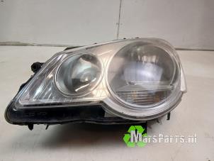 Gebruikte Linker Koplamp Volkswagen Polo IV (9N1/2/3) 1.2 Prijs € 35,00 Margeregeling aangeboden door Autodemontagebedrijf De Mars