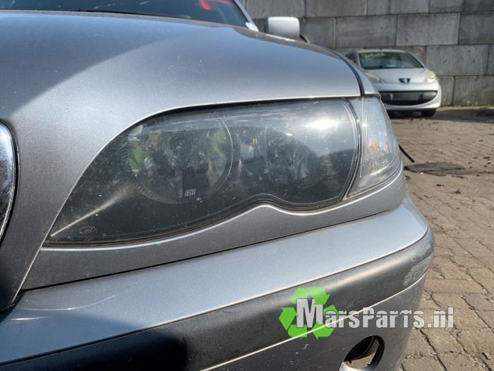 Strålkastare, vänster från en BMW 3 serie (E46/4) 316i 16V 2003