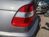 Baklykta, vänster från en BMW 3 serie (E46/4) 316i 16V 2003