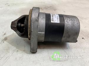 Używane Rozrusznik Ford Focus 3 Wagon 1.0 Ti-VCT EcoBoost 12V 100 Cena € 30,00 Procedura marży oferowane przez Autodemontagebedrijf De Mars