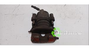 Używane Zacisk hamulcowy lewy przód Volkswagen Polo V (6R) 1.4 TDI 12V 90 Cena € 25,00 Procedura marży oferowane przez Autodemontagebedrijf De Mars