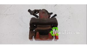 Używane Zacisk hamulcowy lewy tyl Volkswagen Polo V (6R) 1.4 TDI 12V 90 Cena € 40,00 Procedura marży oferowane przez Autodemontagebedrijf De Mars