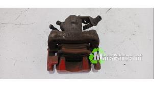 Używane Zacisk hamulcowy prawy tyl Volkswagen Polo V (6R) 1.4 TDI 12V 90 Cena € 40,00 Procedura marży oferowane przez Autodemontagebedrijf De Mars