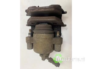 Używane Zacisk hamulcowy lewy przód Volkswagen Polo V (6R) 1.2 TSI 16V BlueMotion Technology Cena € 25,00 Procedura marży oferowane przez Autodemontagebedrijf De Mars