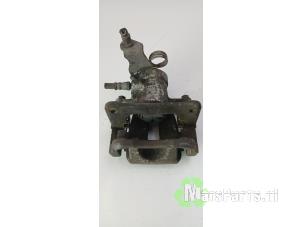 Begagnade Bakre bromsok, höger Opel Corsa E 1.3 CDTi 16V ecoFLEX Pris € 60,00 Marginaltabell erbjuds av Autodemontagebedrijf De Mars