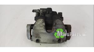 Begagnade Främre bromsok, höger Opel Corsa E 1.3 CDTi 16V ecoFLEX Pris € 30,00 Marginaltabell erbjuds av Autodemontagebedrijf De Mars