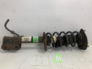 Używane Amortyzator lewy przód Mitsubishi Colt (Z2/Z3) 1.1 12V Cena € 35,00 Procedura marży oferowane przez Autodemontagebedrijf De Mars