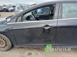 Używane Drzwi lewe przednie wersja 4-drzwiowa Ford Focus 3 Wagon 1.6 TDCi ECOnetic Cena € 100,00 Procedura marży oferowane przez Autodemontagebedrijf De Mars