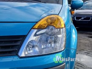 Używane Reflektor lewy Renault Modus/Grand Modus (JP) 1.2 16V Cena € 50,00 Procedura marży oferowane przez Autodemontagebedrijf De Mars