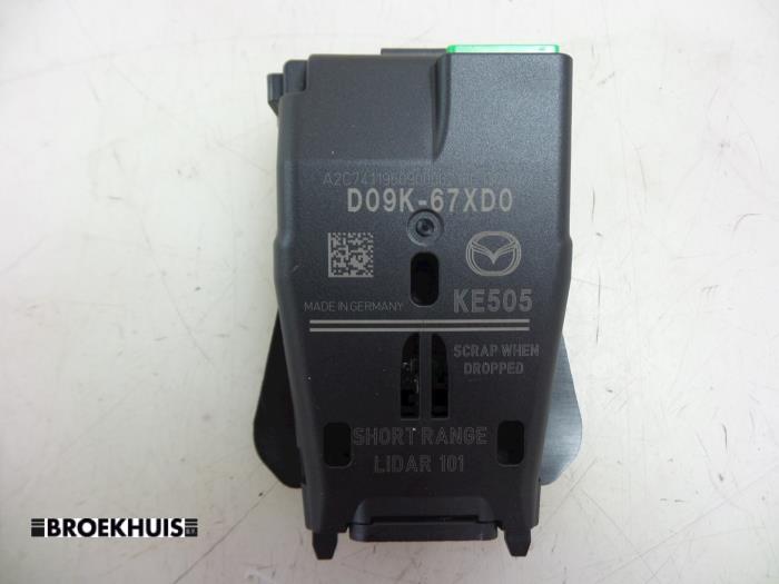 Bromsassistanssensor från en Mazda 2 (DJ/DL) 1.5 SkyActiv-G 90 2019