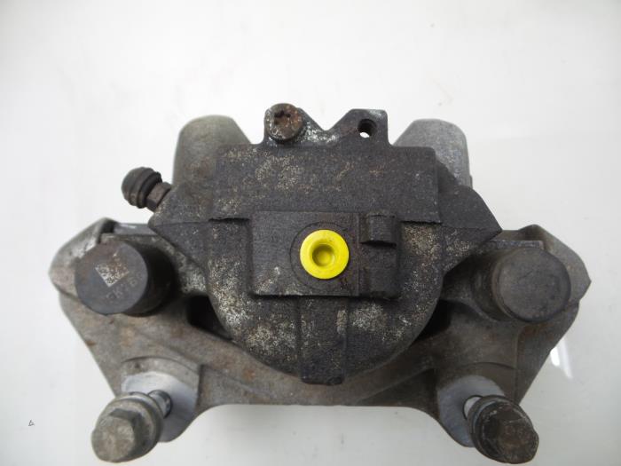 Främre bromsok, vänster från en Land Rover Discovery Sport (LC) 2.0 Si4 16V 2015