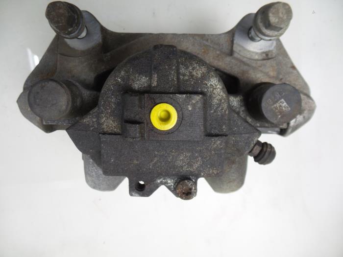 Främre bromsok, vänster från en Land Rover Discovery Sport (LC) 2.0 Si4 16V 2015