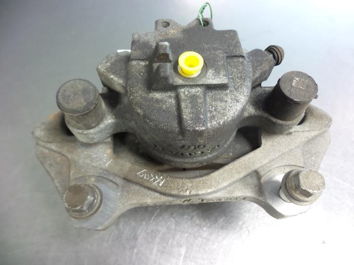 Främre bromsok, höger från en Land Rover Discovery Sport (LC) 2.0 Si4 16V 2015