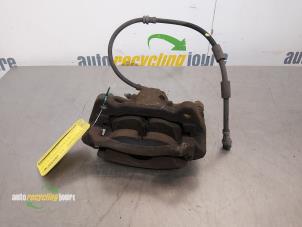 Używane Zacisk hamulcowy lewy przód Skoda Octavia Combi (5EAC) 1.4 TSI 16V Cena € 24,99 Procedura marży oferowane przez Autorecycling Joure B.V.