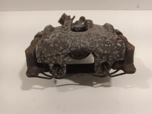 Begagnade Bakre bromsok, vänster Ford Transit Connect Pris € 45,00 Marginaltabell erbjuds av Van der Ven Autorecycling B.V.