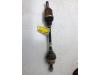 Opel Corsa E 1.4 16V Aandrijfas links-voor
