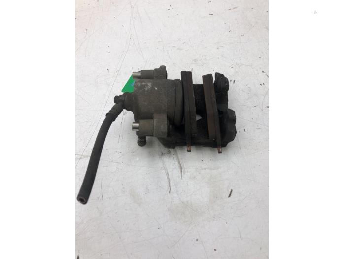 Främre bromsok, vänster från en Volkswagen Up! (121) 1.0 12V 60 2020