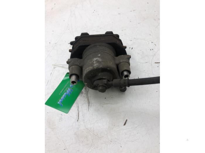 Främre bromsok, vänster från en Volkswagen Up! (121) 1.0 12V 60 2020