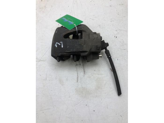 Främre bromsok, vänster från en Volkswagen Up! (121) 1.0 12V 60 2020