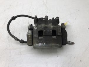 Gebruikte Remklauw (Tang) rechts-voor Mitsubishi Eclipse Cross (GK/GL) 2.4 16V PHEV 4x4 Prijs € 125,00 Margeregeling aangeboden door Autobedrijf G.H. Wessel B.V.