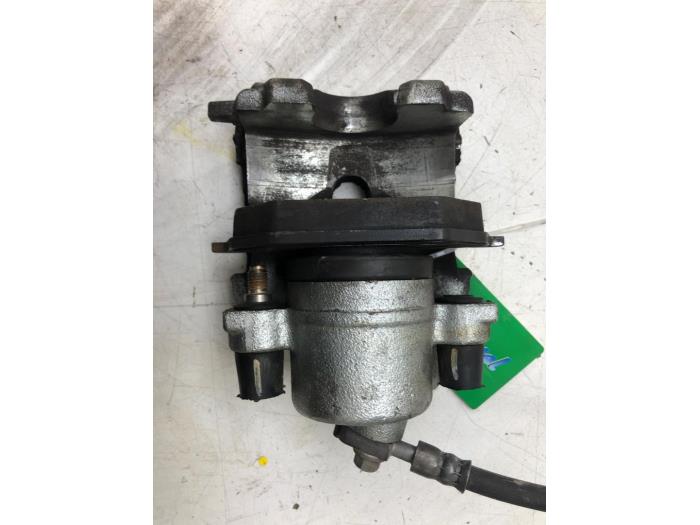 Främre bromsok, vänster från en Volkswagen Up! (121) 1.0 12V 60 2020