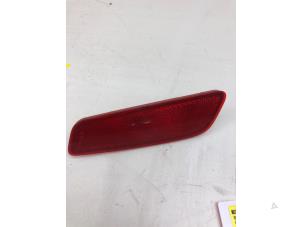Gebruikte Bumper reflector rechts-achter Opel Mokka Prijs € 39,00 Margeregeling aangeboden door Autobedrijf G.H. Wessel B.V.