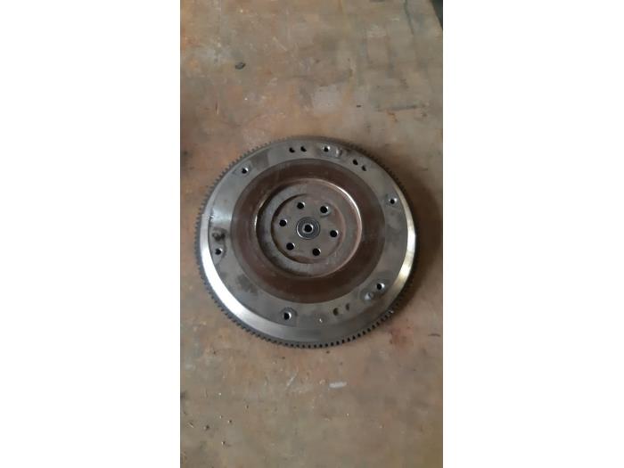 Svänghjul från en Opel Agila (A) 1.2 16V 2004