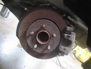 Begagnade Bakre bromsskiva Ford Focus 2 Wagon 1.6 TDCi 16V 110 Pris € 45,00 Marginaltabell erbjuds av Boekholt autodemontage B.V