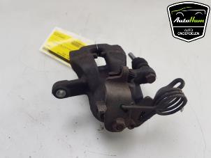 Używane Zacisk hamulcowy lewy tyl Ford Mondeo IV Wagon 2.0 16V Cena € 35,00 Procedura marży oferowane przez AutoHam