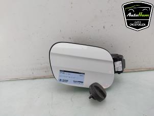 Begagnade Tanklucka Volkswagen T-Cross 1.0 TSI 95 12V Pris € 50,00 Marginaltabell erbjuds av AutoHam