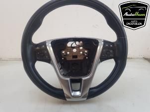 Begagnade Ratt Volvo V60 I (FW/GW) 2.4 D6 20V Plug-in Hybrid AWD Pris € 95,00 Marginaltabell erbjuds av AutoHam