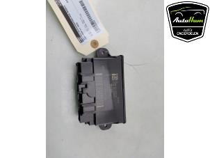 Begagnade Centrallåsmodul Ford Kuga III (DFK) 2.5 PHEV 16V Pris € 25,00 Marginaltabell erbjuds av AutoHam