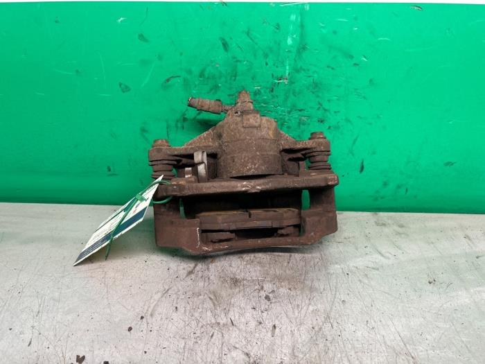 Främre bromsok, vänster från en Opel Agila (A) 1.2 16V Twin Port 2005