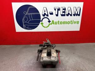 Używane Zacisk hamulcowy prawy tyl Volkswagen Touran (1T1/T2) 1.6 FSI 16V Cena € 19,99 Procedura marży oferowane przez A-Team Automotive