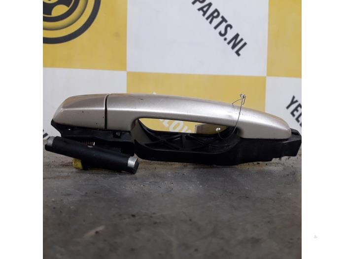 Portiergreep 4Deurs links-achter van een Suzuki Grand Vitara II (JT) 2.0 16V 2006