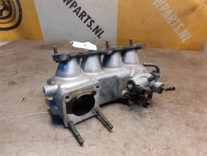 Begagnade Insugsrör Suzuki X-90 (SZ416) 1.6 16V 4x4 Pris € 50,00 Marginaltabell erbjuds av Yellow Parts