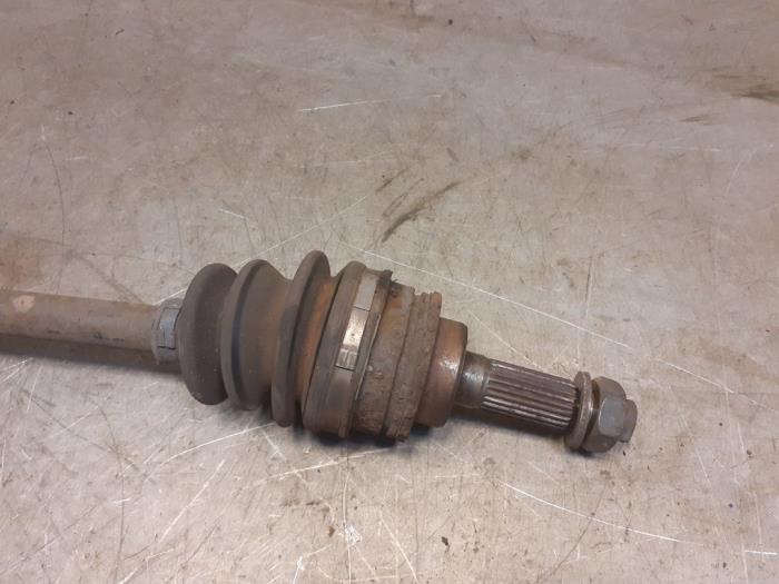 Drivaxel, vänster fram från en Suzuki Ignis (FH) 1.3 16V 2001