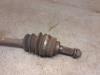Drivaxel, vänster fram från en Suzuki Ignis (FH) 1.3 16V 2001